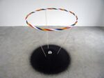 Christian Frosi, HHH, 2007, sabbia ceramizzata nera, hula hoop, sfera di acciaio, balsa, dimensioni variabili. Courtesy l’artista & ZERO..., Milano