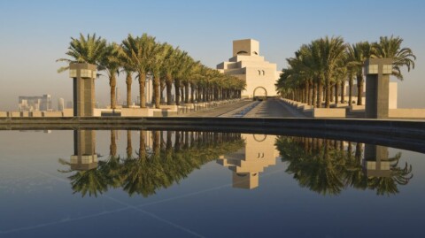 he Museum of Islamic Art’s main building entrance façade through the palm tree alley. Courtesy of the Museum of Islamic Art
