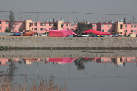 Communal by Design, Iztapalapa reflecting on El Sadado regulatory basin, 2013, Mexico City, Mexico. Image © Loreta Castro Reguera