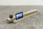 Marco Strappato, Untitled (ground), 2015, cemento, marmo Portoro, diam. 10 cm, iPad (video in loop), photo Marco De Rosa