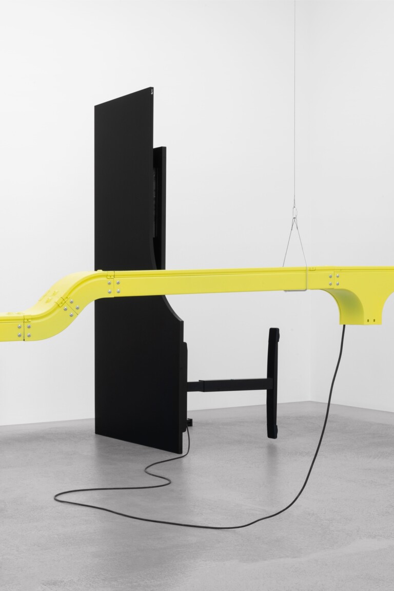 Eva & Franco Mattes, The Bots, 2020. Customized OKA desk, monitor, video, headphones, various cables 200 x 100 x h100 cm each approx. Installed at Fotomuseum Winterthur Photo by Melania Dalle Grave and Piercarlo Quecchia for DSL Studio