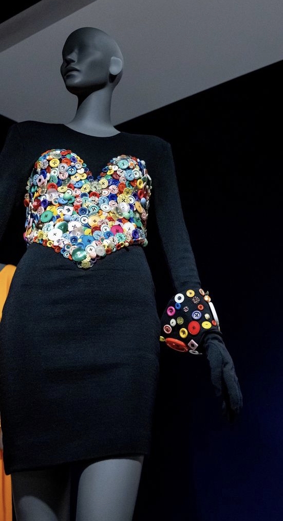 Patrick Kelly, "Day Dress with matching gloves," Fall/Winter 1986-1987, wool, plastic, and glass. FIDM Museum Collection: Gift of Linda & Steve Plochocki. Loan courtesy of FIDM Museum at the Fashion Institute of Design & Merchandising, Los Angeles