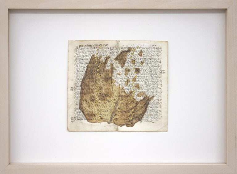 Senza titolo (Serie SCRITTURE), 1980s. Antique book page, rice paper, black India ink, gold leaf