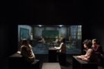 Leandro Erlich, Classroom (2017), Two rooms of identical dimensions, wood, windows, desk, chairs, door, glass, lights, blackboard, school supplies and other classroom decorations, and black boxes. Dimensions variable