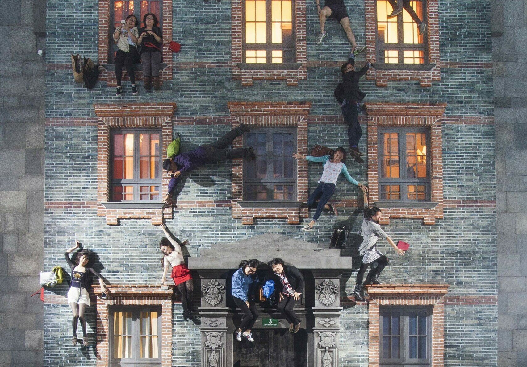 Leandro Erlich, Shikumen (2004), A building facade laid flat under a mirror suspended at a 45-degree angle. Dimensions variable. Fourteen different facades each specific to the city that hosted the temporary installation