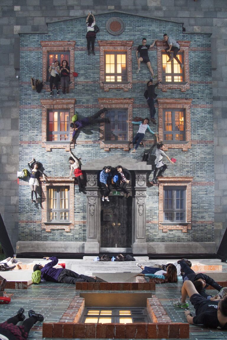 Leandro Erlich, Shikumen (2004), A building facade laid flat under a mirror suspended at a 45-degree angle. Dimensions variable. Fourteen different facades each specific to the city that hosted the temporary installation