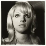 Blonde girl with shiny lipstick, N.Y.C. 1967 © The Estate of Diane Arbus. Collection Maja Hoffmann / LUMA Foundation