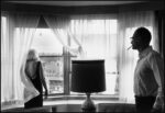 USA. Reno, Nevada. 1960. Set of "The Misfits". Marilyn Monroe and Arthur Miller in their suite in Reno’s Mapes Hotel after a day’s shooting © Magnum Photos