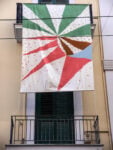 Mario Nardulli, Gonfalone, 2017, colori acrilici su cotone, m 2 x 3,5, installation view for Il mattino ha Lory in bocca, Bari, 2023. Photo Ezia Mitolo