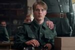 All the Light We Cannot See. Louis Hofmann as Werner Pfennig in episode 103 of All the Light We Cannot See. Cr. Katalin Vermes/Netflix © 2023