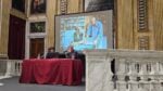 Davide Ferrario all’incontro Italo Calvino e le città, Genova, Palazzo Ducale (sullo schermo, il regista con Violante Placido). Photo Linda Kaiser