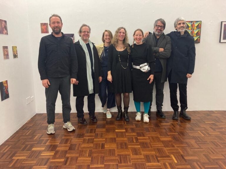 Norma Mangione con alcuni degli artisti che rappresenta alla Norma Mangione Gallery di Torino