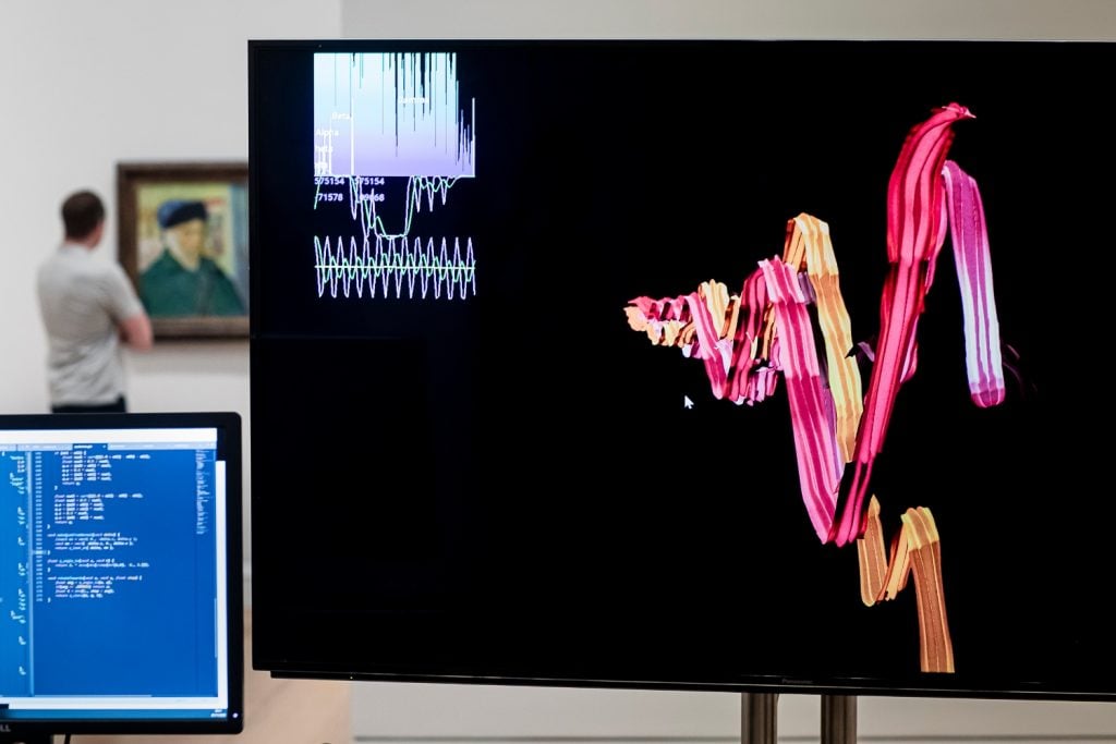 Brainwaves on screen with Van Gogh in background. Photo Hydar Dewachi, courtesy of Art Fund.