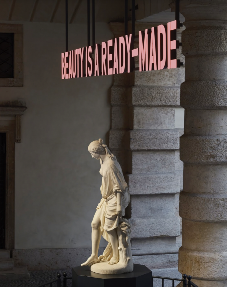 Claire Fontaine (Collettivo - Parigi, 2004), Beauty is a ready made, 2024, Lettere a LED tridimensionali, struttura e supporto Alessandro Puttinati, La Bagnante, 1846, Marmo di Carrara, Verona, Palazzo Maffei Casa Museo. Photo: Andrea Pugiotto