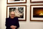 Carlo Verdone davanti alle sue fotografie esposte al Polo del '900 a Torino