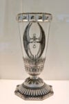 Ornate vase with the MTO Shahmaghsoudi® emblem, Iran, 20th century. Glass, silver. Courtesy of Musée d’Art et de Culture Soufis MTO. Photo by Flint Culture
