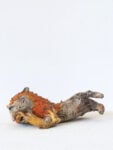 Salvatore Fancello Leone con criniera rossa e preda 1938 glazed terracotta 10,5 x 26,3 x 14,5 cm/ 4 x 10.4 x 5,7 in