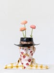 Stefania Carlotti Summer Kisses, Winter Tears n. 1 2025 glazed ceramic, flowers 32 x 48 x 32 cm / 12.6 x 19 x 12.6 in