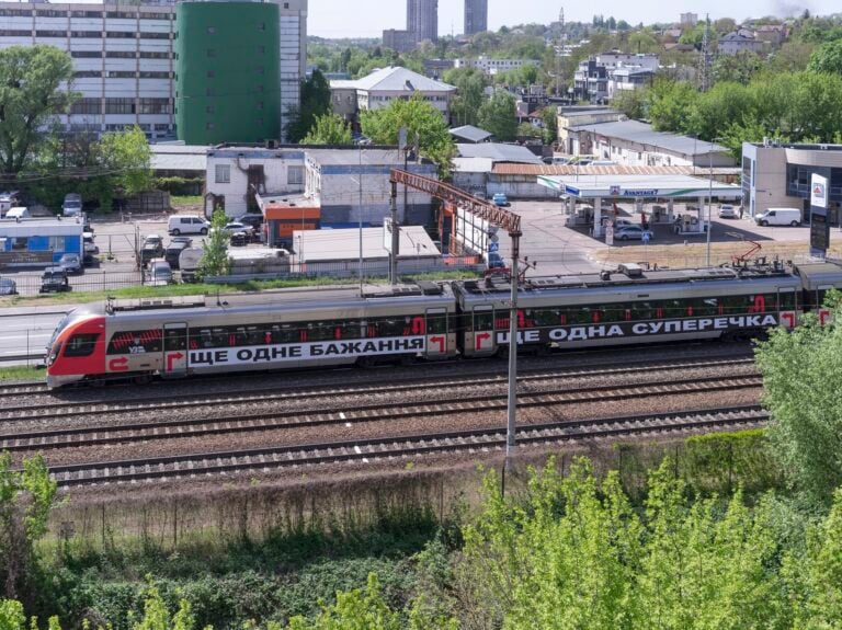 Barbara Kruger, Untitled (Another Again) 2025, Ukrainian Railways Intercity Train, Ukraine. Courtesy of the artist, RIBBON International, Ukrainian Railways, and Sprüth Magers. Ph. Vitalii Halanzha