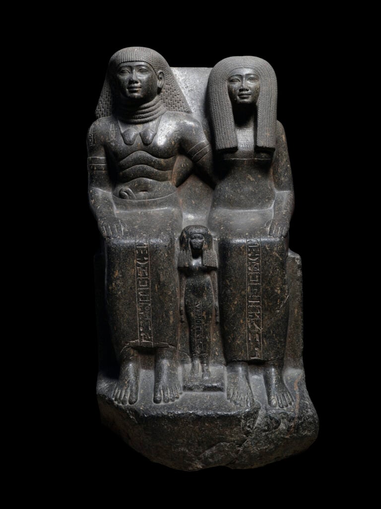 Seated Statue of Sennefer, his Wife Senetnay and Daughter Mutnofret
Dynasty 18
Granodiorite
H. 126 cm, W. 76 cm, L. 65 cm Egyptian Museum, Cairo
Photo credit: © Fotografie di Massimo Listri