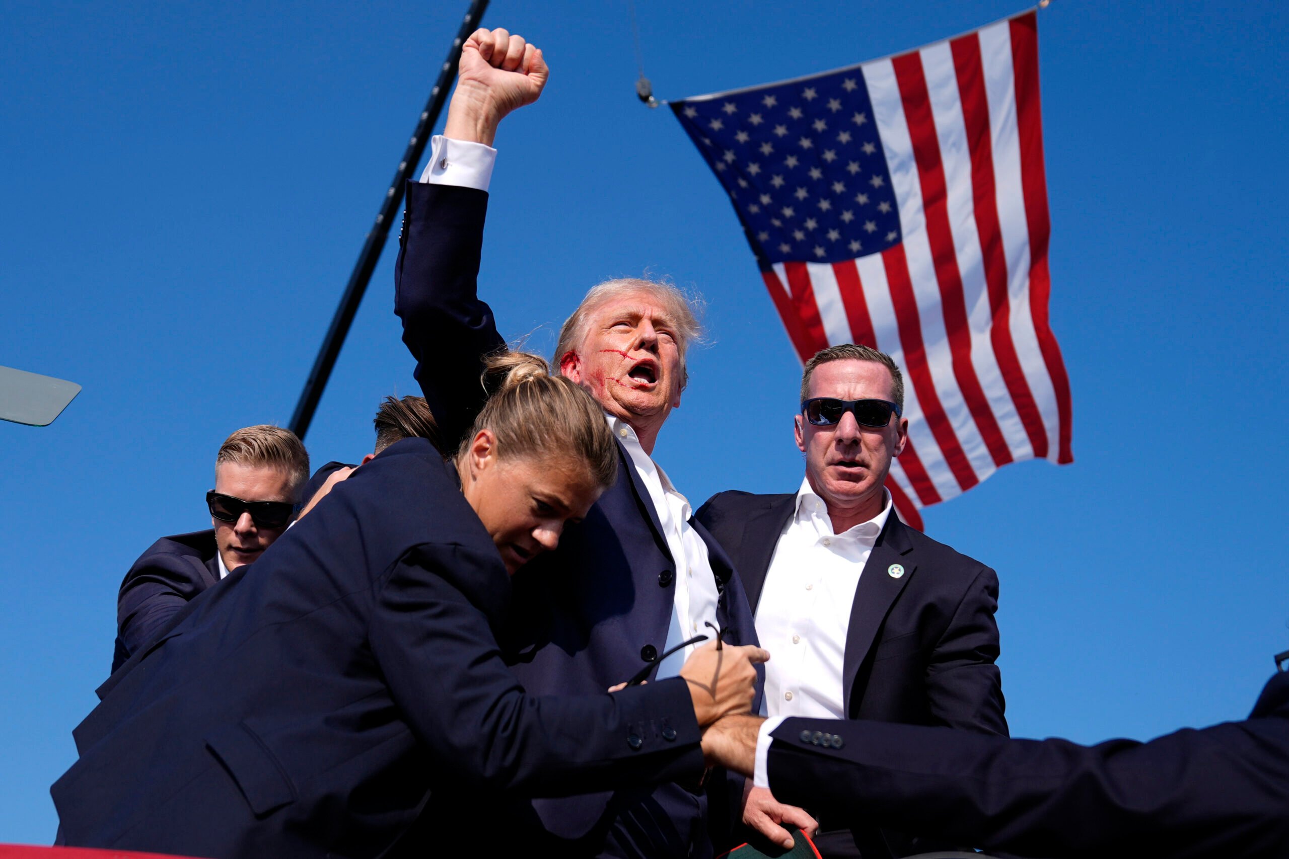 https://www.artribune.com/wp-content/uploads/2025/10/election-2024-trump-shooting-gun-laws-74198-scaled.jpg