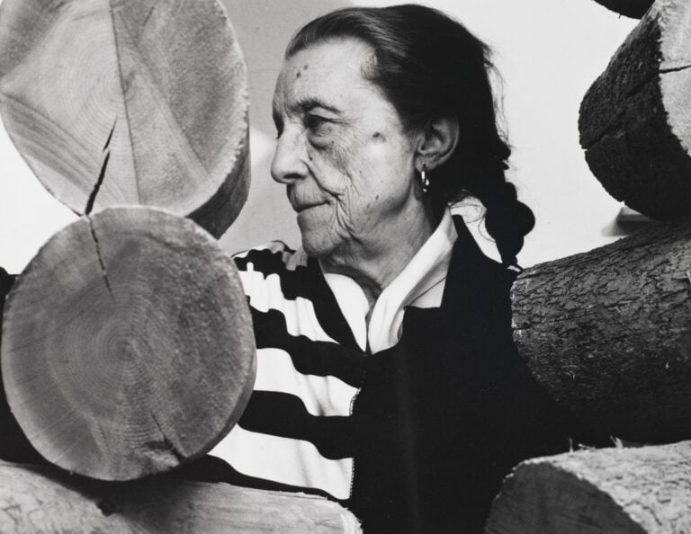 695277 Louise Bourgeois (Sculpture), 1988 (gelatin silver photograph on fiber based paper) by Mones, Arthur (1919-98); sheet:27.2x35.6 image:27.2x34.5 cm; Brooklyn Museum, New York, USA; (add.info.: Louise Bourgeois (1911-1910), French-American artist and sculptor. ); Photo © Brooklyn Museum; Gift of the Artist. Please note: This photograph requires additional permission prior to use. If you wish to reproduce this image, please contact Bridgeman Images and we will manage the permission request on your behalf.