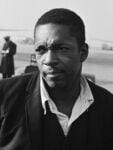 John Coltrane at Schiphol for a concert in The Hague, Amsterdam, 1963 @Hugo van Gelderen / Anefo, CC0, via Wikimedia Commons