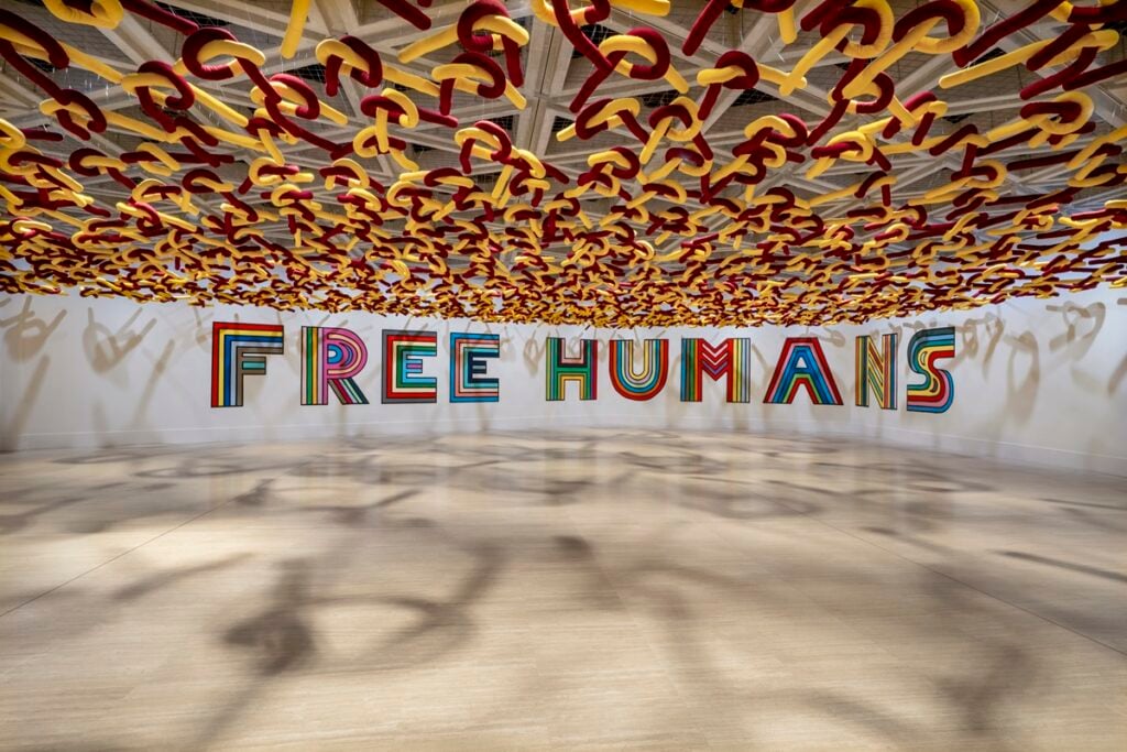 Paola Pivi, Share, but it&rsquo;s not fair 2012-2025/ Free Humans 2008. Paola Pivi, Untitled (donkey), 2023. Installation view, The Art Gallery of Western Australia (AGWA), Perth, 2025. Courtesy Paola Pivi e Perrotin, Sentence by Karma Culture Brothers. Photo Ela Bialkowska, OKNO studio