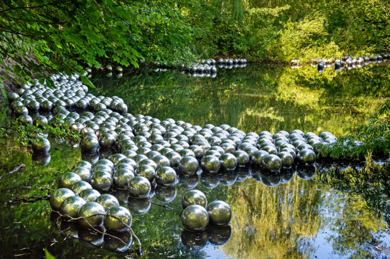 Yayoi Kusama, Narcissus Garden, 1966/2020. Installation view, Louisiana Museum of Modern Art. Stainless steel spheres. Courtesy Ota Fine Arts, David Zwirner and Victoria Miro. Louisiana Museum of Modern Art / Photo: Kim Hansen. &copy; YAYOI KUSAMA
