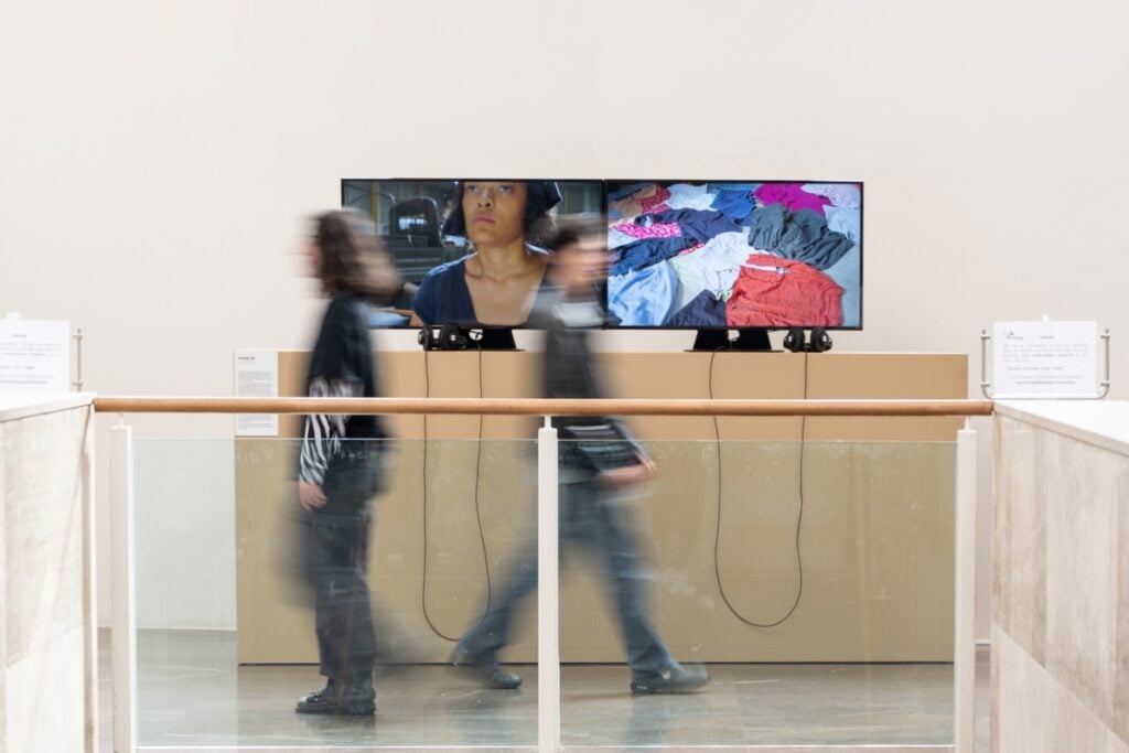 ART.it - Art in Transition, proiezione doppio schermo del film precario Life di Lucy Jorge Orta Mambo Museo d'Arte Moderna di Bologna, ph Claudia Gentile