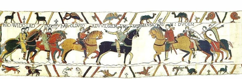 Bayeux Tapestry, Scene13, Guy de Ponthieu, a sinistra, mani Harold sopra a William il Conquistatore, a destra. Wikipedia Commons