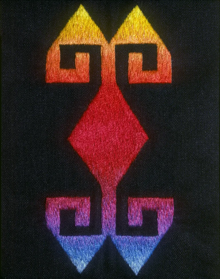 Judy Chicago, Logo from the Holocaust Project, 1992. Stained glass, 42 x 48.5 x 1.25 in. (106.68 x 123.19 x 3.18 cm). &copy; Chicago Woodman LLC, Judy Chicago/Artists Rights Society (ARS), New York Photo &copy; Chicago Woodman LLC, Donald Woodman/Artists Rights Society (ARS), New York