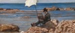 I Macchiaioli, Giovanni Fattori, Silvestro Lega che dipinge sugli scogli, 1866-1867. Olio su tavola, 13 x 28,5 cm. Collezione privata