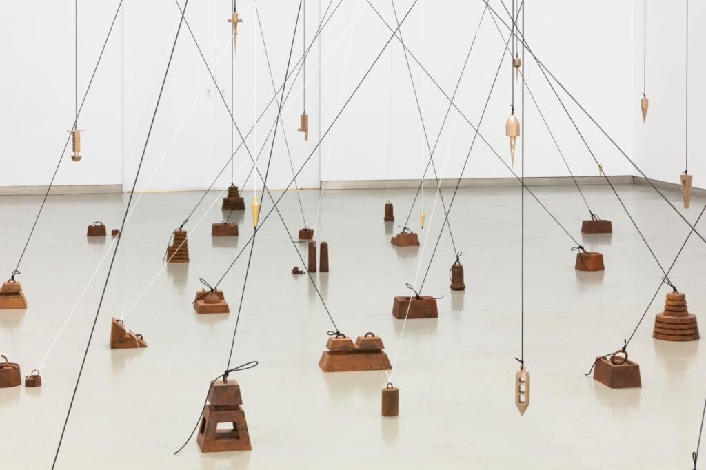 Galleria Continua, Carlos Garaicoa_Contrapeso (Ciudad Plomada) 2022 bronze, iron, steel, nylon variable dimensions