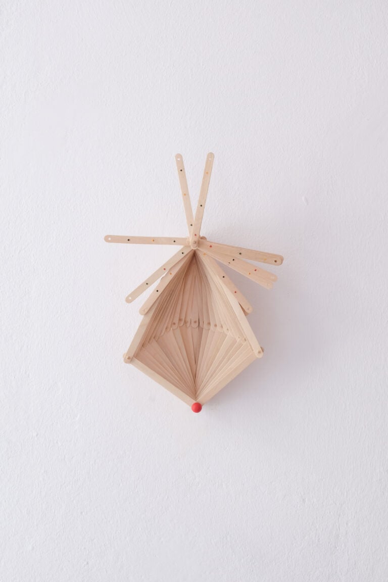 As if it were a nut splitting (dalla serie Cantilene), 2023, bastoncini per gelati, legno di betulla, mine di matite colorate, 22 x 30 cm. Veduta dell&rsquo;installazione alla galleria Heerz Tooya, Veliko Tărnovo. Photo: MathewLacosse