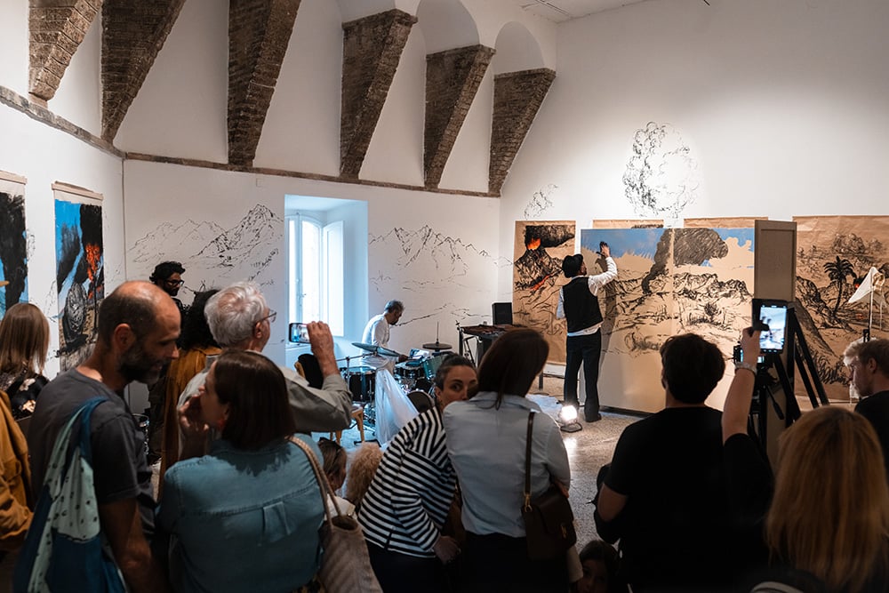 Nikhil Chopra - EMBERS / BRACI Nikhil Chopra and Uriel Barthélémi, 2026, 3 hours performance-installation, GALLERIA CONTINUA / San Gimignano, ©️ Francesco Raco